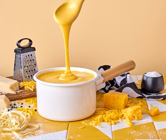 Cheese Sauce. Food styling for The Happy Food Co. Photographed by Adam Fine.