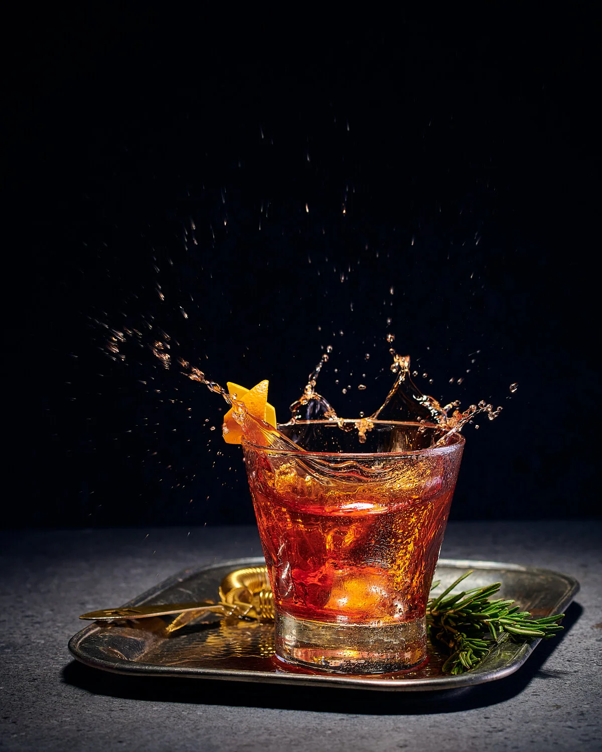 Rosemary smoked negroni cocktail styled for Airport Craft Brewers restaurant. Drink styling by Bianca Delides. Photographed by Dylan Swart.