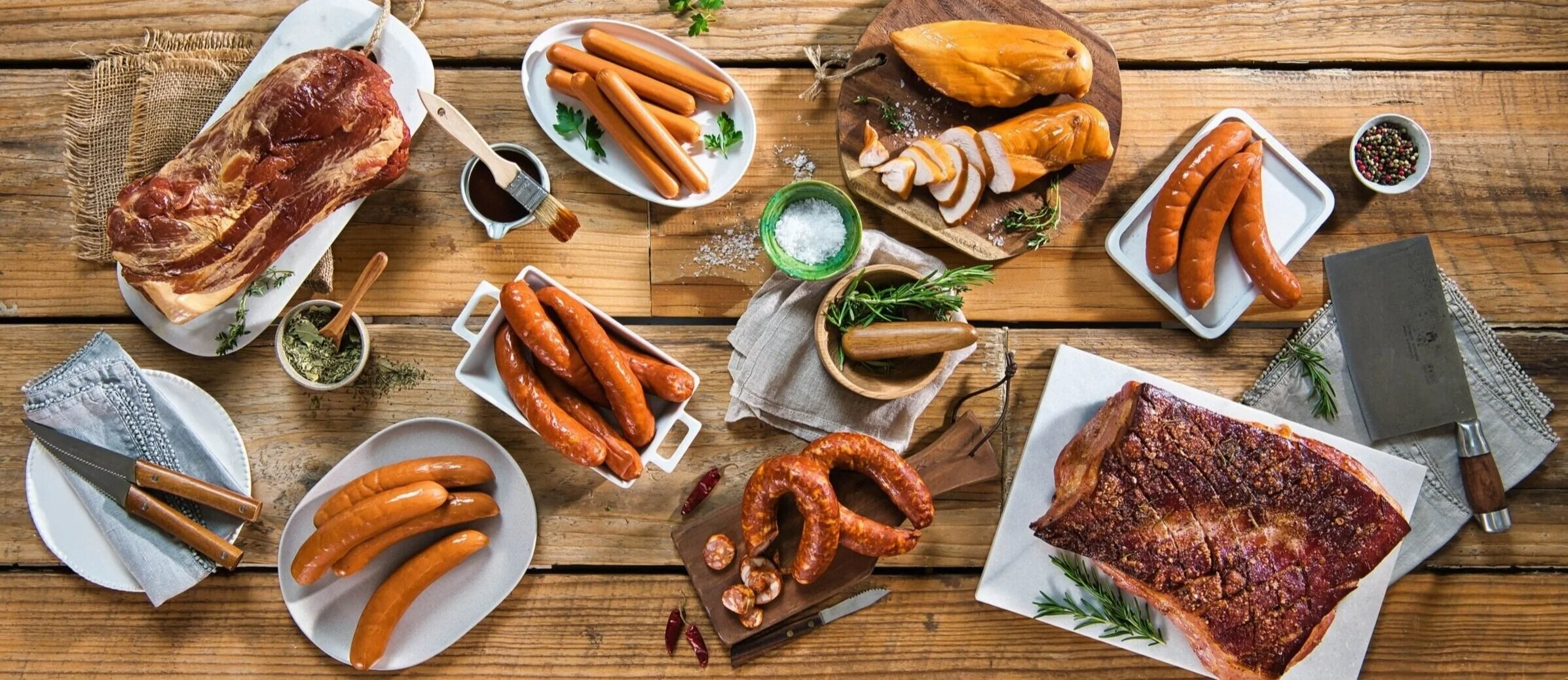 Selection of sausages, roasts and smoked meats styled for Meat Mania Deli and Butchery. Food styling by Bianca Delides. Photographed by Adam Houghton.