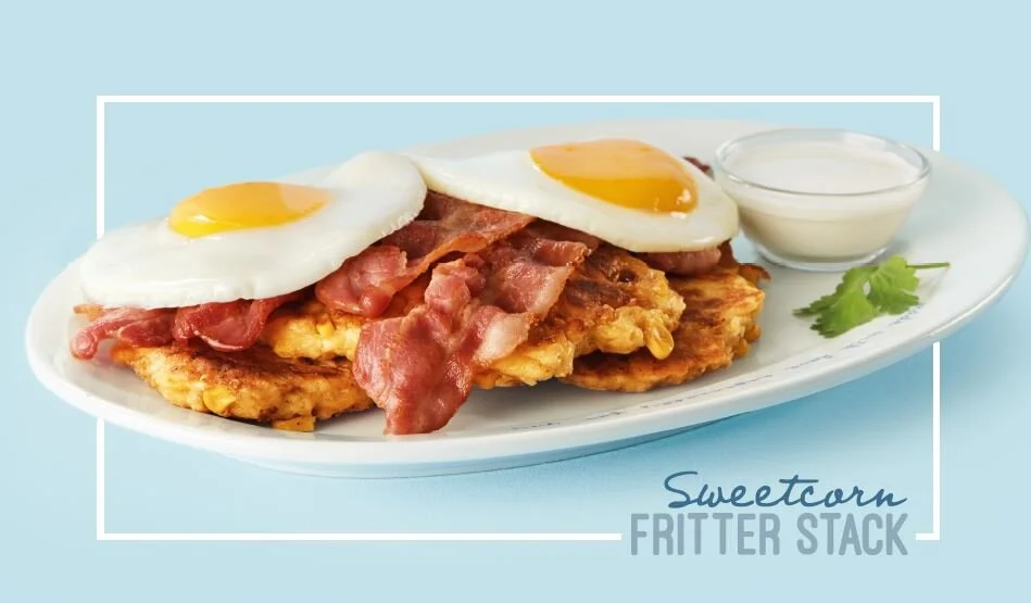 Sweetcorn Fritter Stack styled for Netcafe menu. Food styling by Bianca Delides. Photographed by Adam Fine.