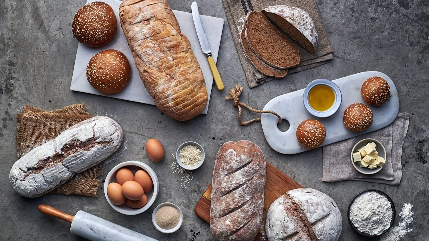 Fresh baked bread selection styled for Airport Craft Brewers restaurant. Drink styling by Bianca Delides. Photographed by Dylan Swart.